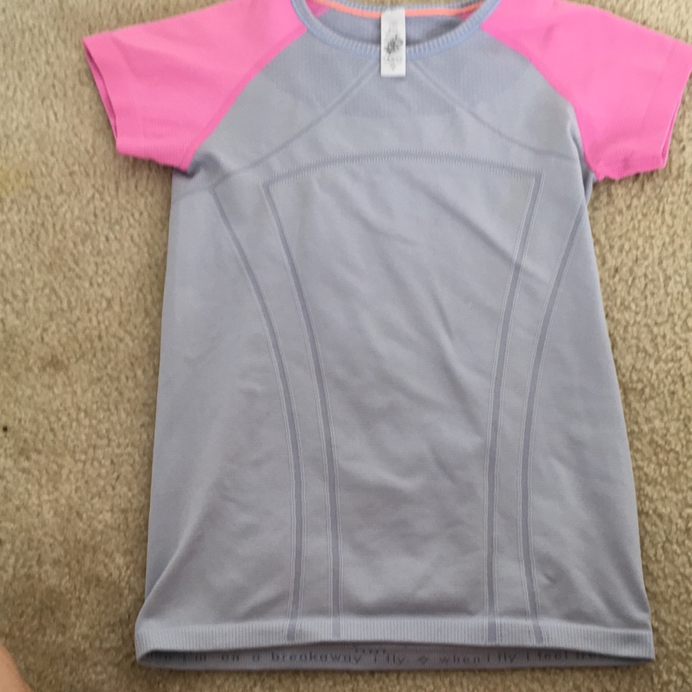 I am selling a ivviva fly tech sst shirt!